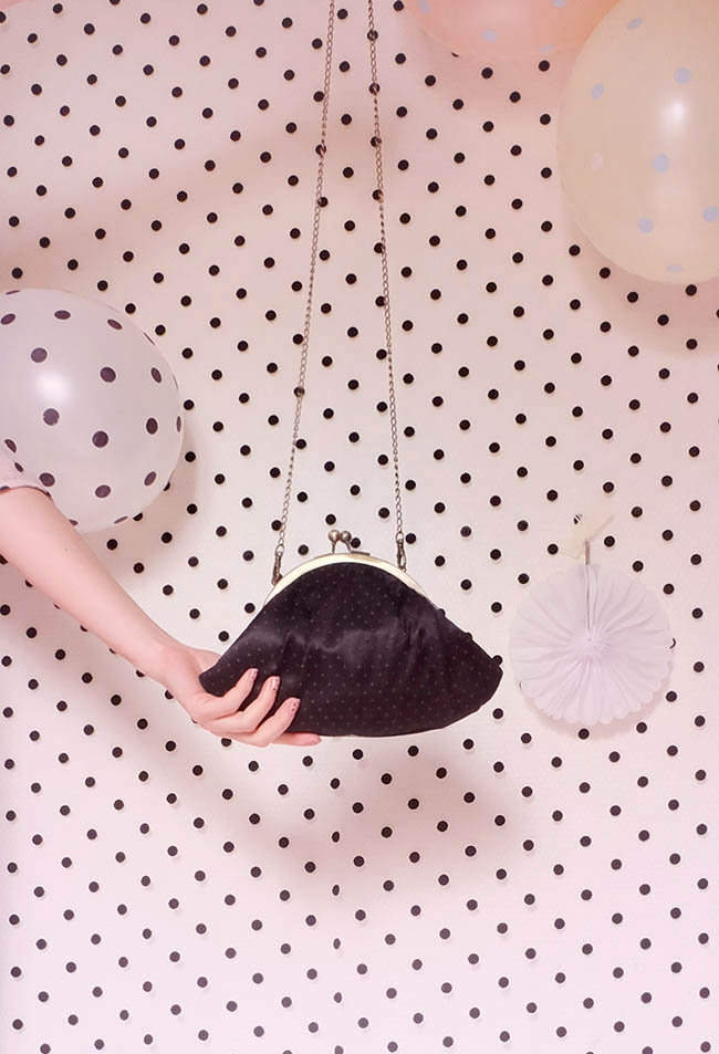 black netting polka dot party bag